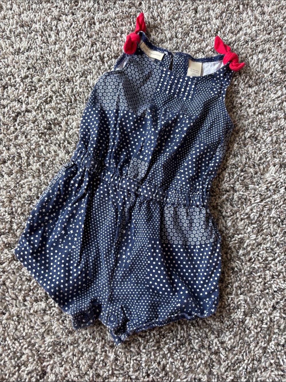 First Impressions Navy Polka & Star Patch Romper with Red Tie Straps